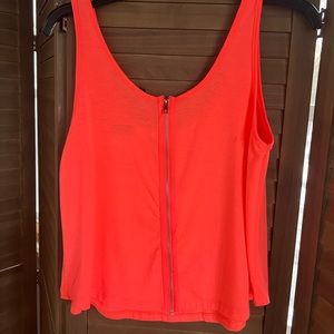 Adorable bright orange tank top, with zipper on the back